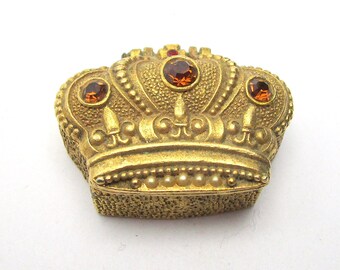 pill with crown on it